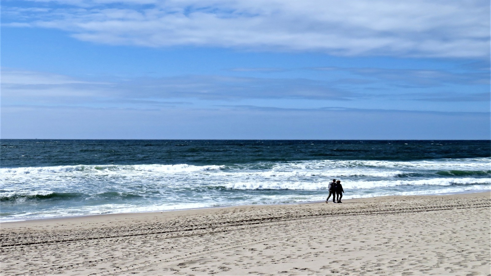 Tourists taking a walk at Puri Sea Beach