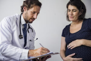 Doctor Examining a Pregnant Woman