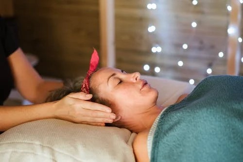 What Are the Benefits of Having an Electric Massage Table with Rollers?