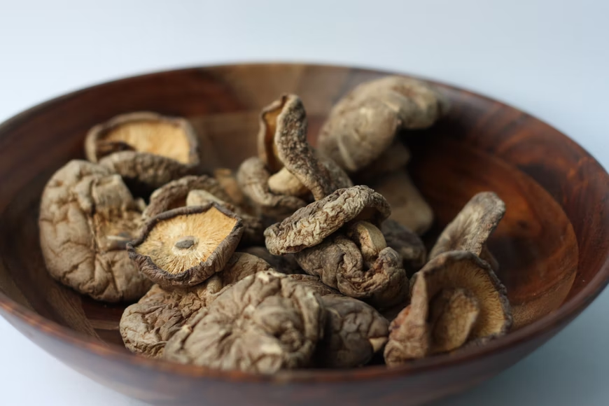 magic mushrooms in a brown bowl