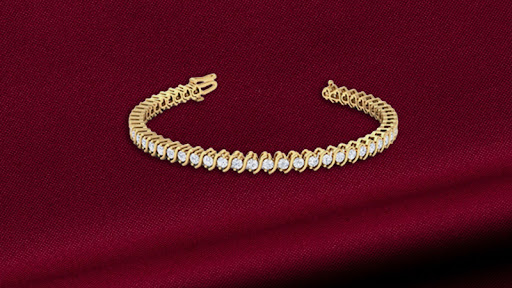 diamond bracelet placed in its fabric-lined original case
