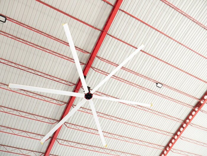 What are some benefits of installing an HVLS fan at your workplace?