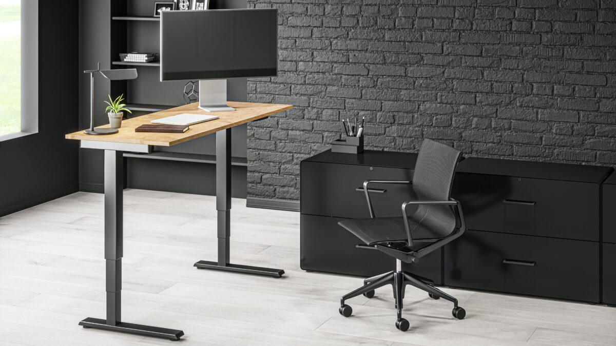 Maximizing Workspace Efficiency with a 3-Monitor Standing Desk Setup