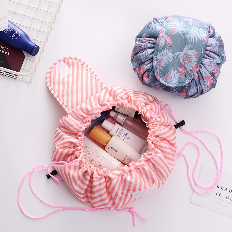 An open makeup pouch with beauty products inside