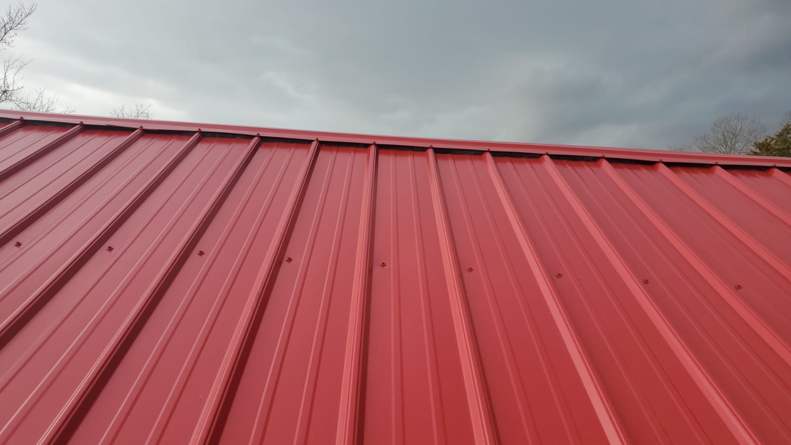 A close-up shot of a standing seam metal roof which was installed on a residential property.