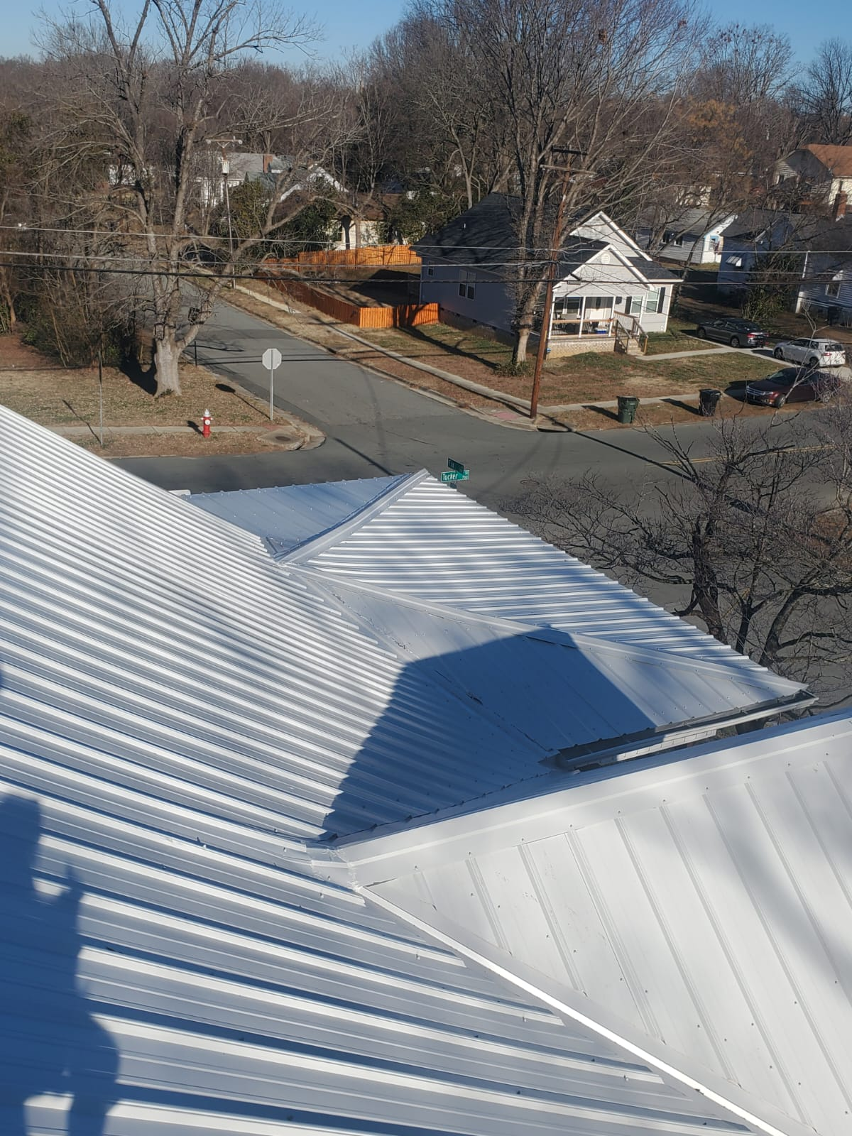 A white metal roof installed by Gator Metal Roofing.