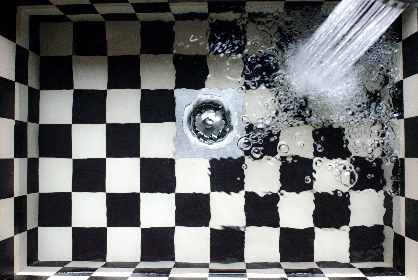 water pooling in a clogged sink