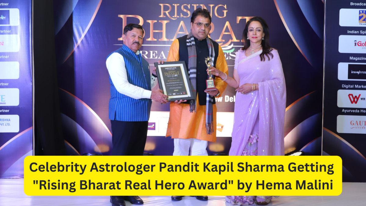 Celebrity Astrologer Pandit Kapil Sharma Getting Award by Hema Malini